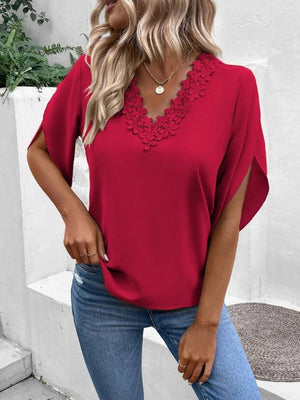 Deep Red flutter sleeve blouse with scalloped lace trim neckline and split sleeves.