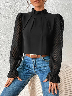 Black chevron sleeve ruffle neck blouse with sheer sleeves.