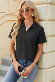 Black textured polo shirt with V-neck and short sleeves, featuring a chest pocket.