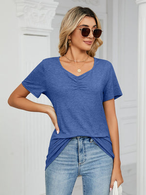 Blue jersey t-shirt with ruched V-neckline and short sleeves.