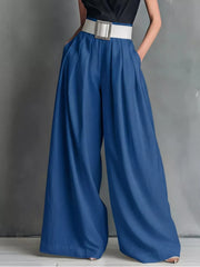 Blue belted high-waisted wide-leg maternity pants with a white buckle belt.