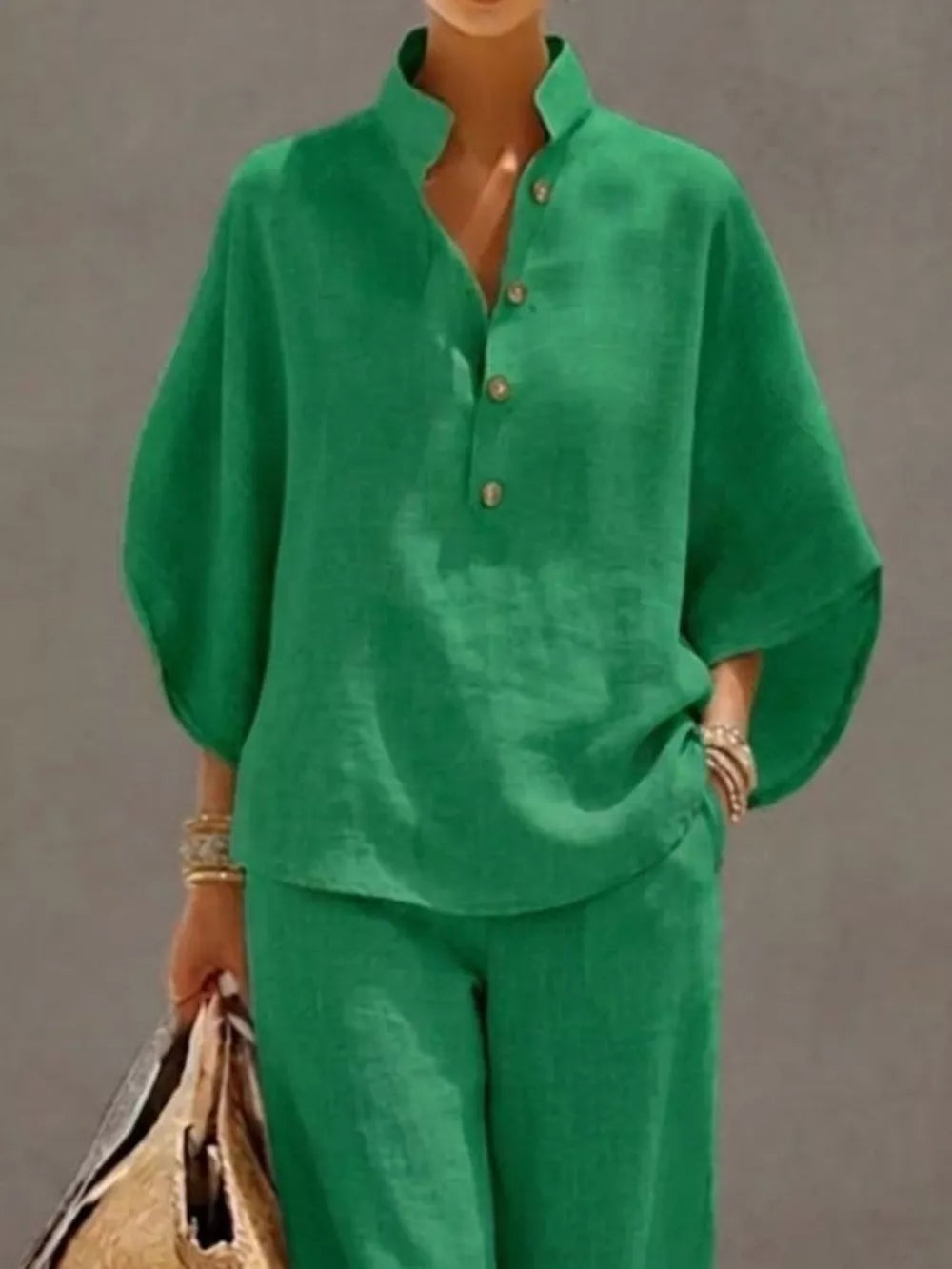 Green button-down loungewear set with a mandarin collar and wide sleeves.