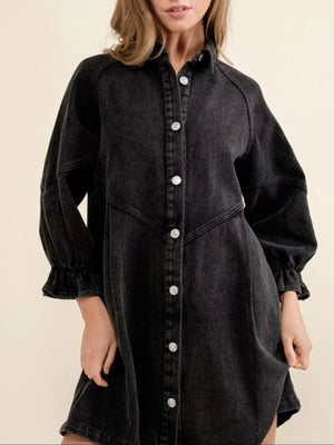 Black denim button-down dress with ruffled cuffs and balloon sleeves.