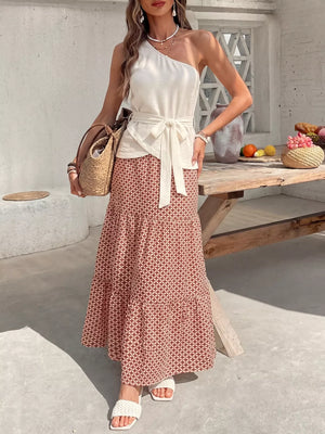 Cream one-shoulder top with tie waist and geometric maxi skirt set