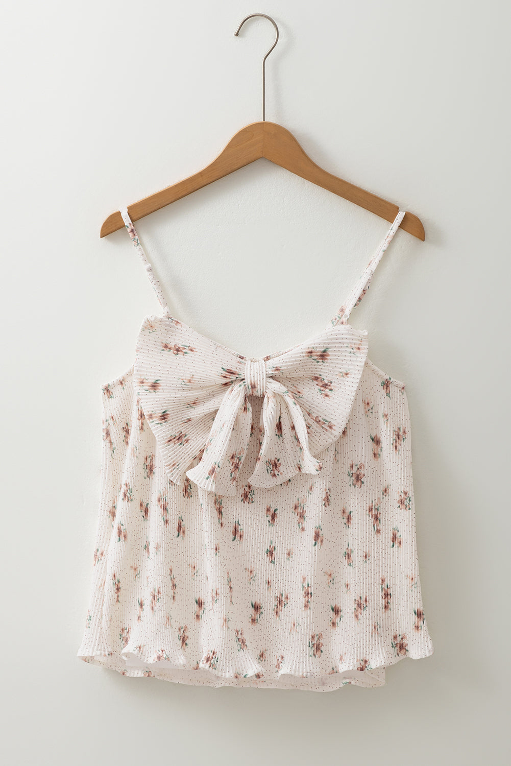 Floral pleated tank top with bow back detail and ruffled hem