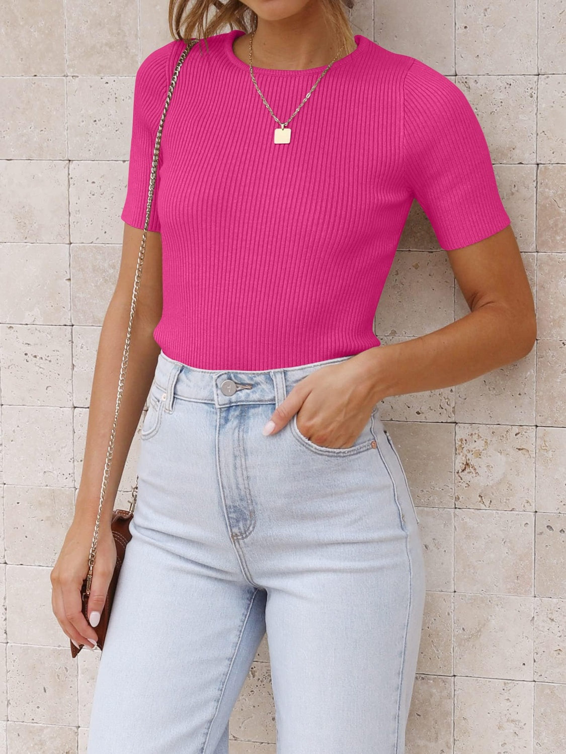 Ribbed crew neck fitted tee in hot pink with short sleeves.