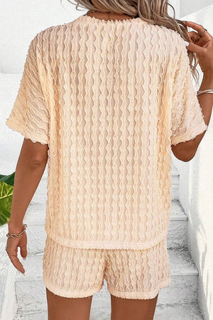 Pastel yellow textured wave co-ord loungewear set with short sleeves and shorts.