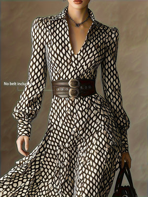 Geometric print midi dress with collar and button-down front, styled with a wide belt.