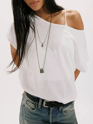 White asymmetrical relaxed fit t-shirt with a single strap and off-the-shoulder design.