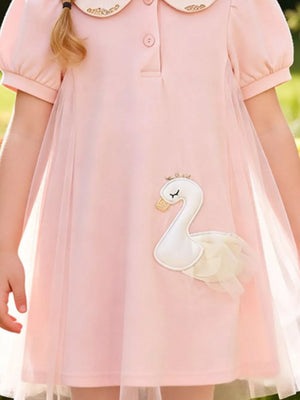 Charming blush pink cotton baby dress with Peter Pan collar and swan appliqué