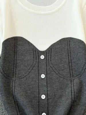 Color block knit t-shirt in white with gray bustier detail and white buttons.