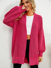 Hot Pink textured cocoon cardigan with balloon sleeves and open front.