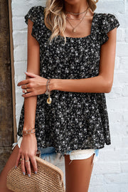 Black floral peplum blouse with flutter sleeves and square neckline