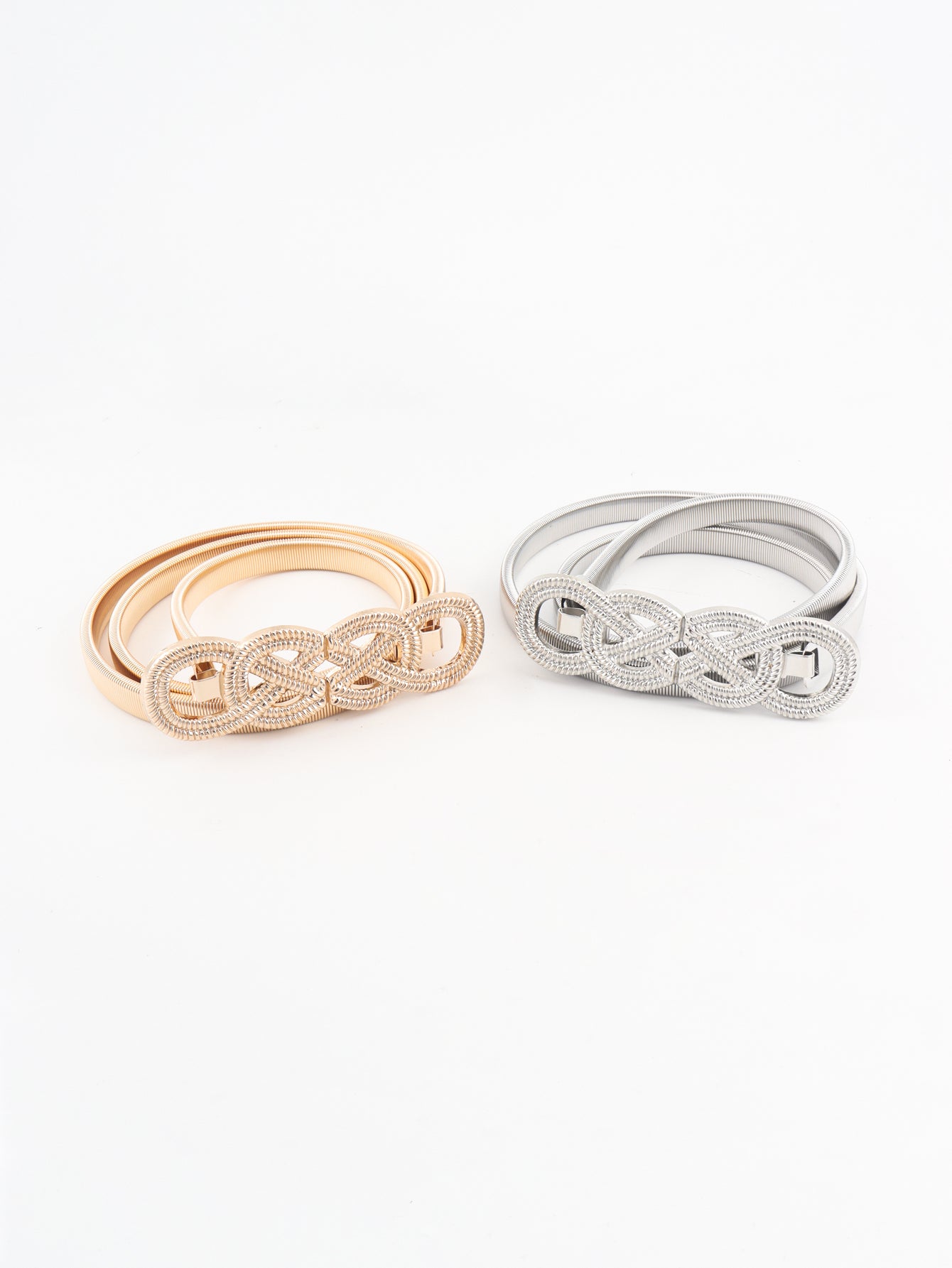 Gold and silver elastic waist belts with intertwined knot detail