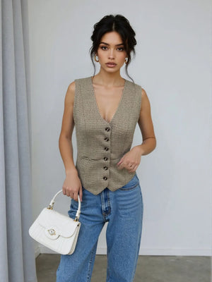 Tailored houndstooth bustier vest in mocha with button front and V-neck.