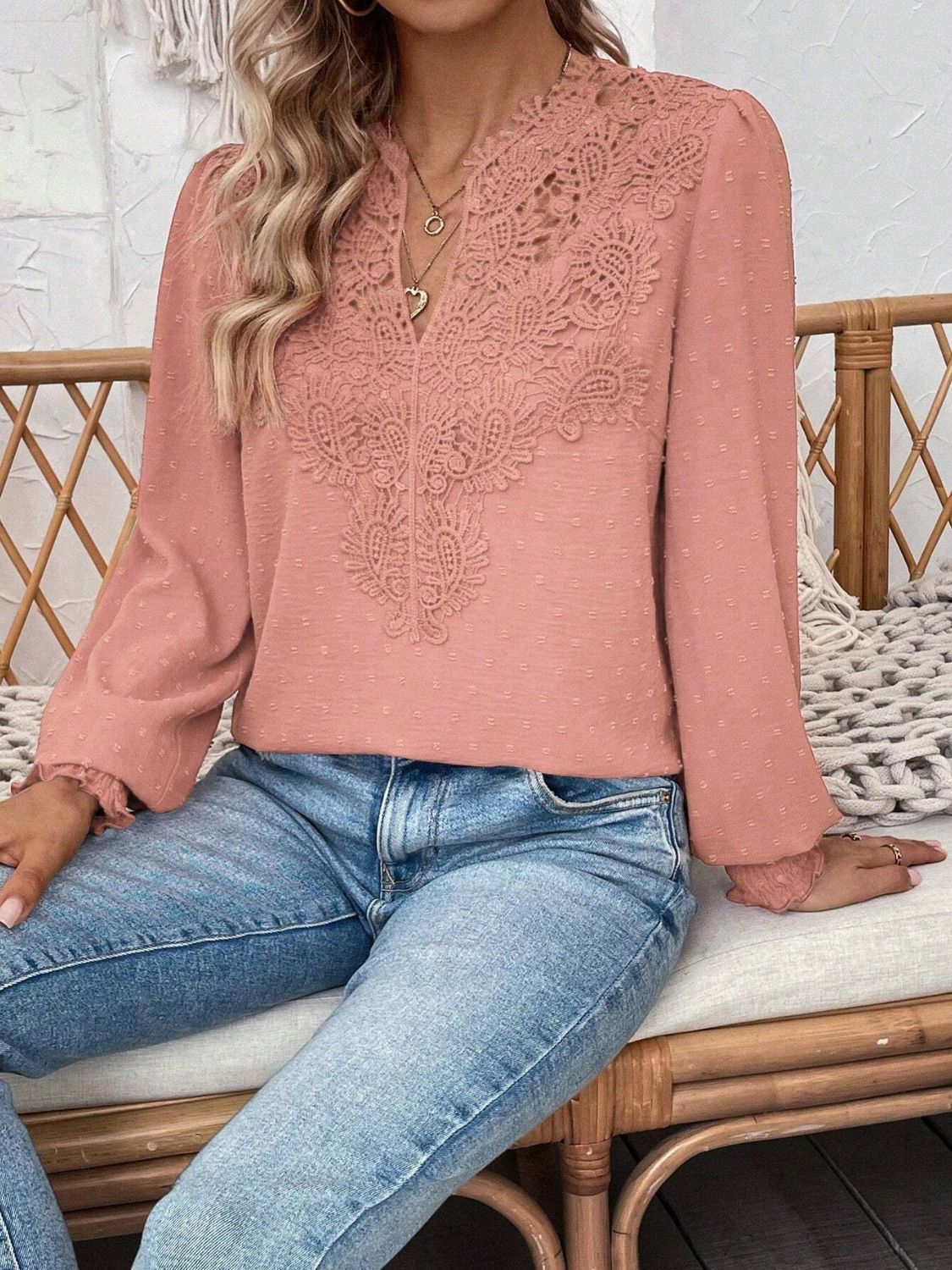 Pink purple embroidered yoke blouse with puff sleeves and textured fabric.