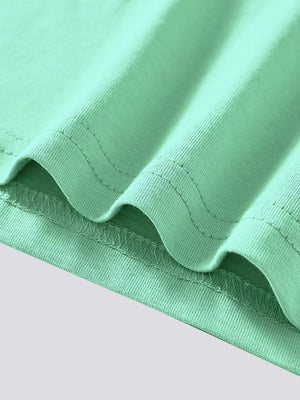 Mint green cotton blend toddler t-shirt detail showing stitching.