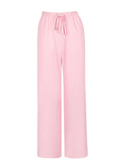Crinkled wide leg pants in pink with a drawstring waist and relaxed fit.