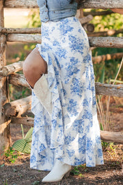 Light blue toile print asymmetric ruffle skirt with ruffled hem detail.