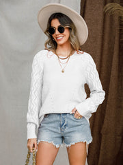 White diamond-cut raglan knit sweater with textured sleeves and a crew neck.