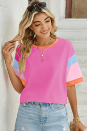 Panel Sleeve Crewneck Tee in Fuchsia Pink with colorblock sleeves and orange trim.