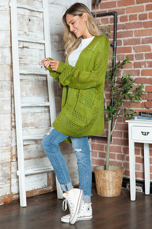 Open-knit slouchy cardigan in matcha green with a relaxed fit and open front.