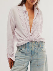 Ruffled linen button-down shirt in Dusty Pink with a knotted hem.