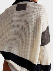 Textured knit cardigan with varsity stripes in cream, black, and dark grey.