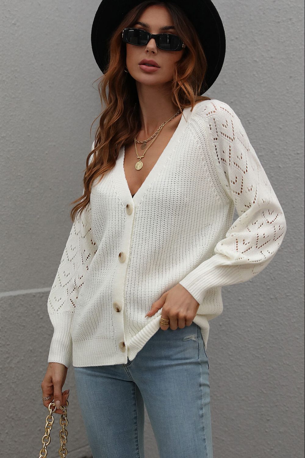 White diamond knit button-down cardigan with V-neck and detailed sleeves