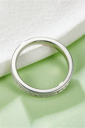 Silver pavé moissanite eternity band ring made of 925 sterling silver.
