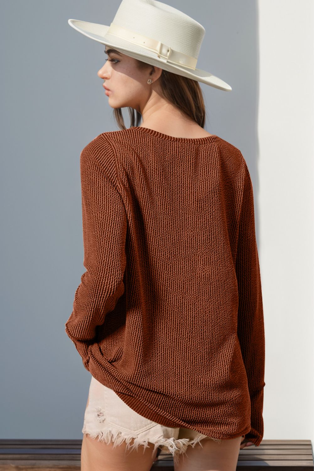 Waffle knit henley shirt in caramel with thumbhole cuffs and a relaxed fit.