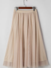 Beige midi skirt with lace overlay and flared hem