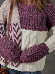Patchwork cable-knit sweater in mauve with mixed stitch patterns and loose fit.