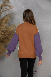 Colorblock knit sweater with brown body, purple sleeves, and white accents.