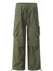 Olive green relaxed fit cargo pants with adjustable drawstring and cinched ankles.