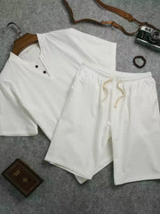 White cotton two-piece set with drawstring shorts and henley top