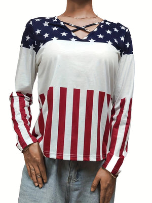 Long sleeve top with crisscross neckline and American flag print.