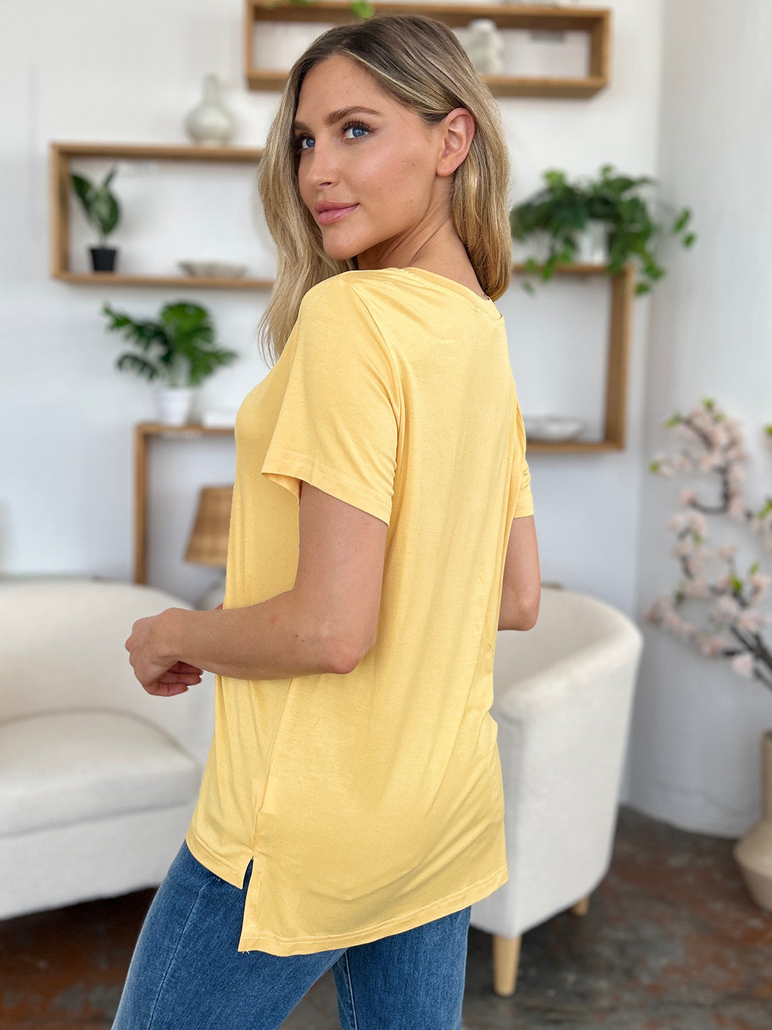 Yellow bamboo t-shirt with V-neck and asymmetric hemline