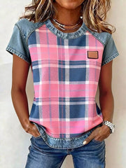Denim patchwork blouse with pink and blue plaid front, short sleeves, and crew neck.