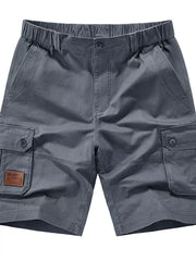 Dark gray cargo chino shorts with elastic waist, button fly, and flap pockets.