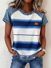Denim patchwork blouse with blue and white stripes, short sleeves, and a round neckline.