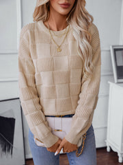 Tan textured checkerboard knit pullover sweater with crew neck and long sleeves.