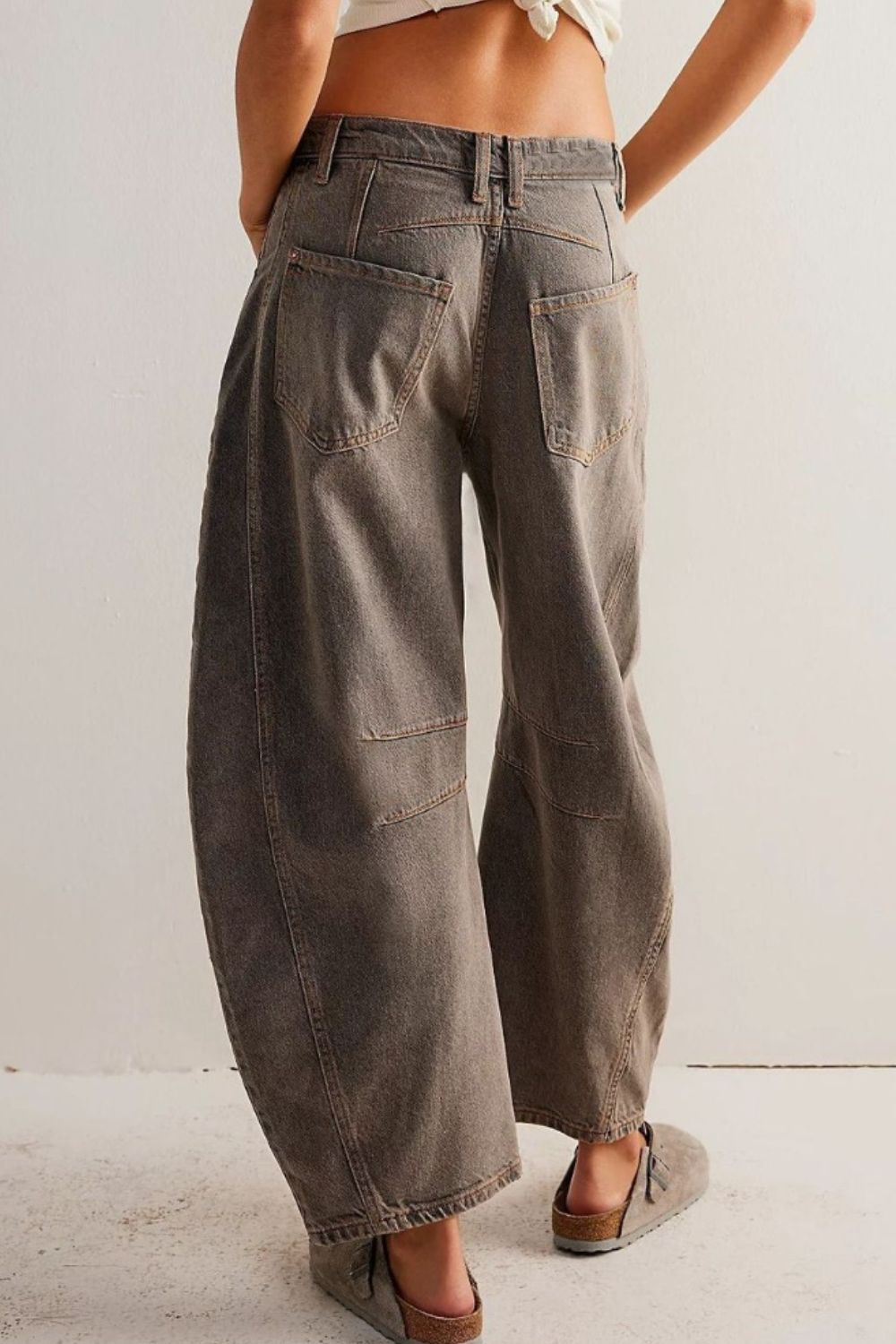 Sculpted denim barrel leg jeans in taupe with button closure and five-pocket styling.