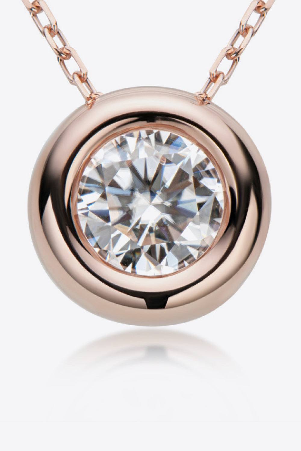 Rose gold bezel-set moissanite solitaire necklace with a delicate chain.