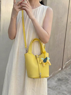 Adjustable Strap Bucket Bag in Gold, side view