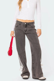 Side stripe wide-leg denim trousers in mocha with white stripe detail and tie hem.