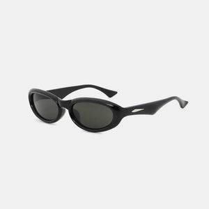 Black cat eye sunglasses with oval lenses and a sleek frame.