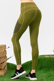 Matcha green performance leggings with mesh pocket detail and contrast stitching.