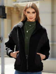 Black quilted & sherpa panel zip jacket with stand-up collar and pockets.