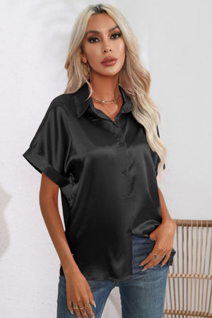 Black satin button-down blouse with cuffed short sleeves and a collared neckline.